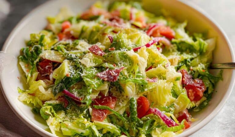 La Scala Chopped Salad served fresh with salami, lettuce, and cheese.