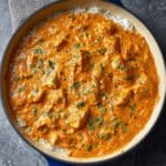 Quick & Easy Homemade Butter Chicken served in a skillet over fluffy white rice