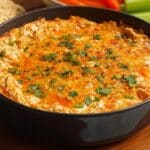 Frank’s Red Hot Buffalo Chicken Dip served in black skillet