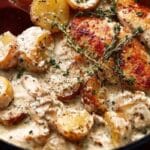 Featured Dutch Oven Creamy Ranch Chicken and Potatoes in red pot