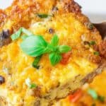 Vegetarian Tater Tot Breakfast Casserole topped with herbs