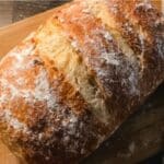 World Easiest Homemade Bread on rustic cutting board