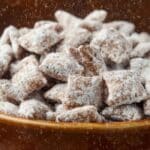 Close-up of Delicious Homemade Puppy Chow in a rustic bowl