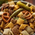Dill Pickle Snack Mix Recipes in a bowl with pretzels and pickles