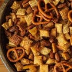 Bowl of Honey Mustard Chex Mix on rustic table