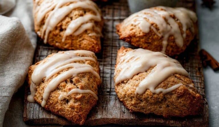 Maple Chai Glazed Scones on rustic board with warm lighting