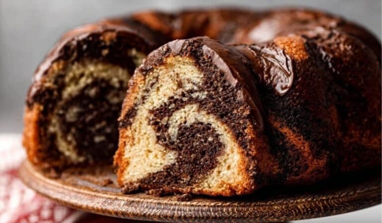 Featured Chocolate Marble Banana Bundt Cake on wooden stand