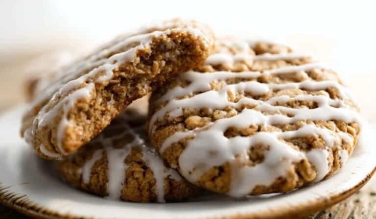 Iced Oatmeal Cookies served on rustic plate