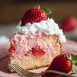 Strawberry Cake sliced on a rustic plate