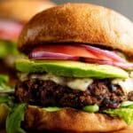 The Best Black Bean Burgers served on wooden board