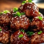 Sticky Korean BBQ Meatballs with Gochujang Glaze in rustic serving bowl