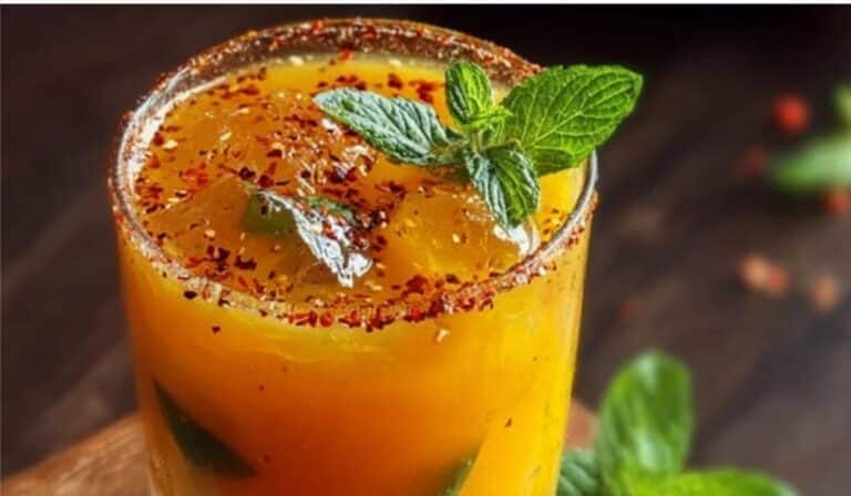 Tamarind Mango Mocktail served with mint and chili salt rim
