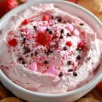 Easy 5-Minute Valentine’s Day Dessert Dip with strawberries and cookies on a board