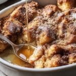 Baked French toast casserole in a baking dish with golden topping