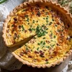 Quiche Lorraine with spring herbs baked golden in a flaky crust